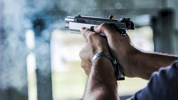 Pistol Mid-shot at an Outdoor Range